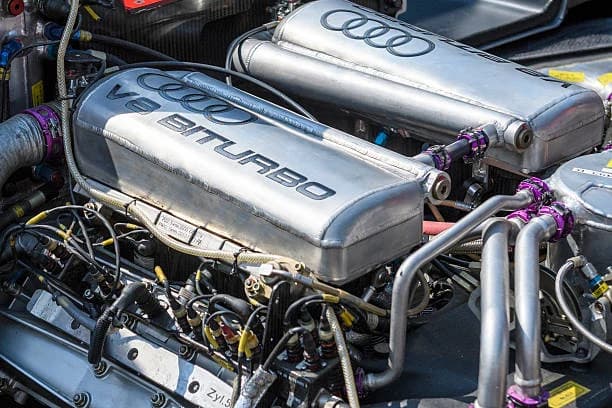 Twin-turbocharged V8 engine with turbo pipework visible, of the type repaired at Brilliant Motors Garage, Welling